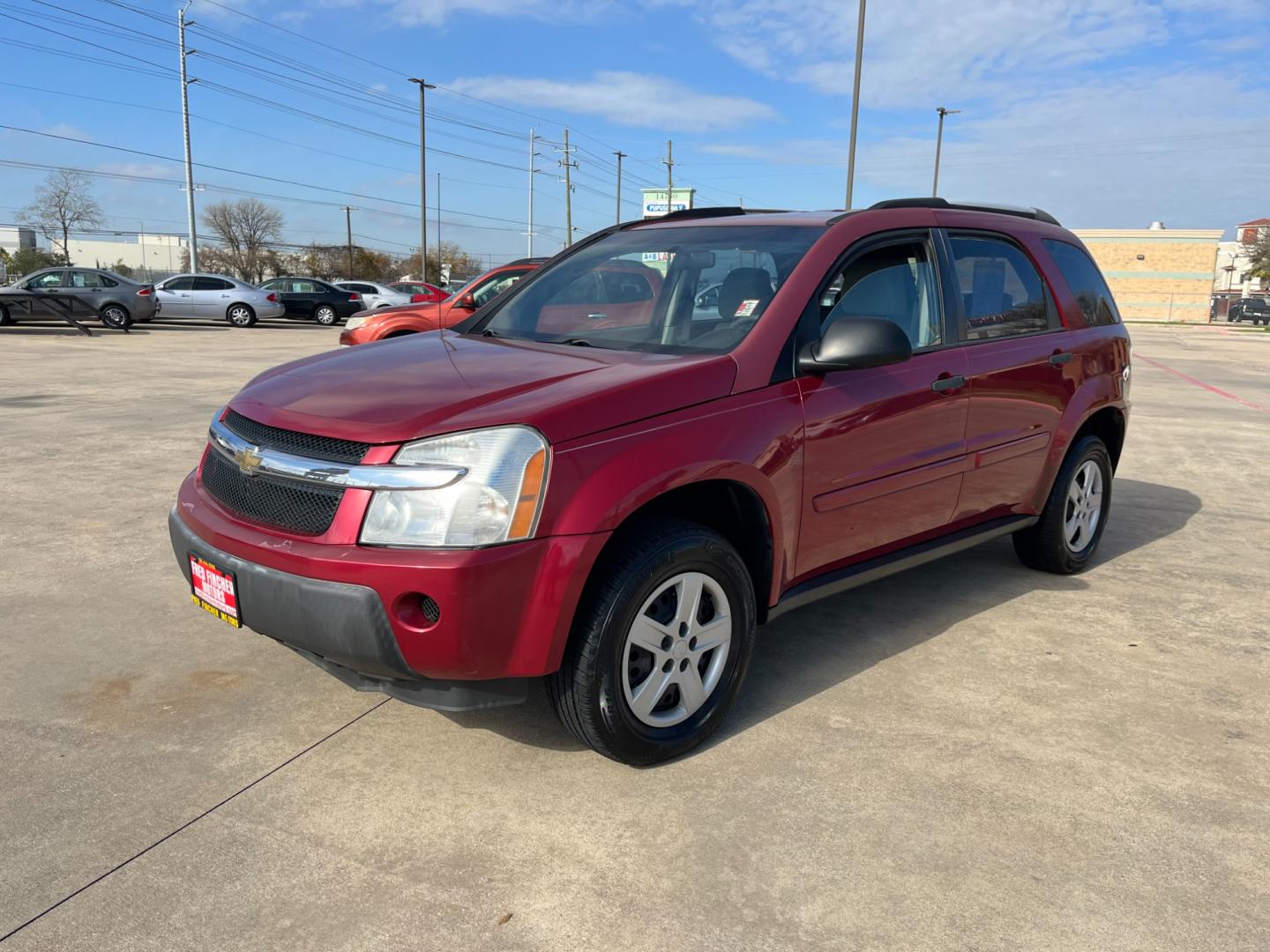 2006 red /TAN Chevrolet Equinox LS 2WD (2CNDL13F366) with an 3.4L V6 OHV 12V engine, 5-Speed Automatic transmission, located at 14700 Tomball Parkway 249, Houston, TX, 77086, (281) 444-2200, 29.928619, -95.504074 - Photo#2